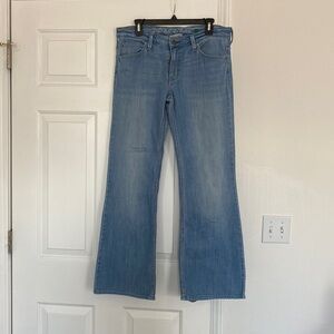 Levi light wash low flare denim.